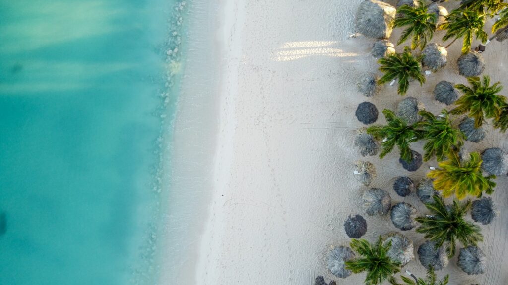 Aerial view of a white sandy Caribbean beach