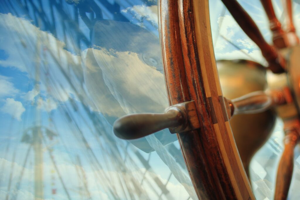 ship's helm on a ship rigging